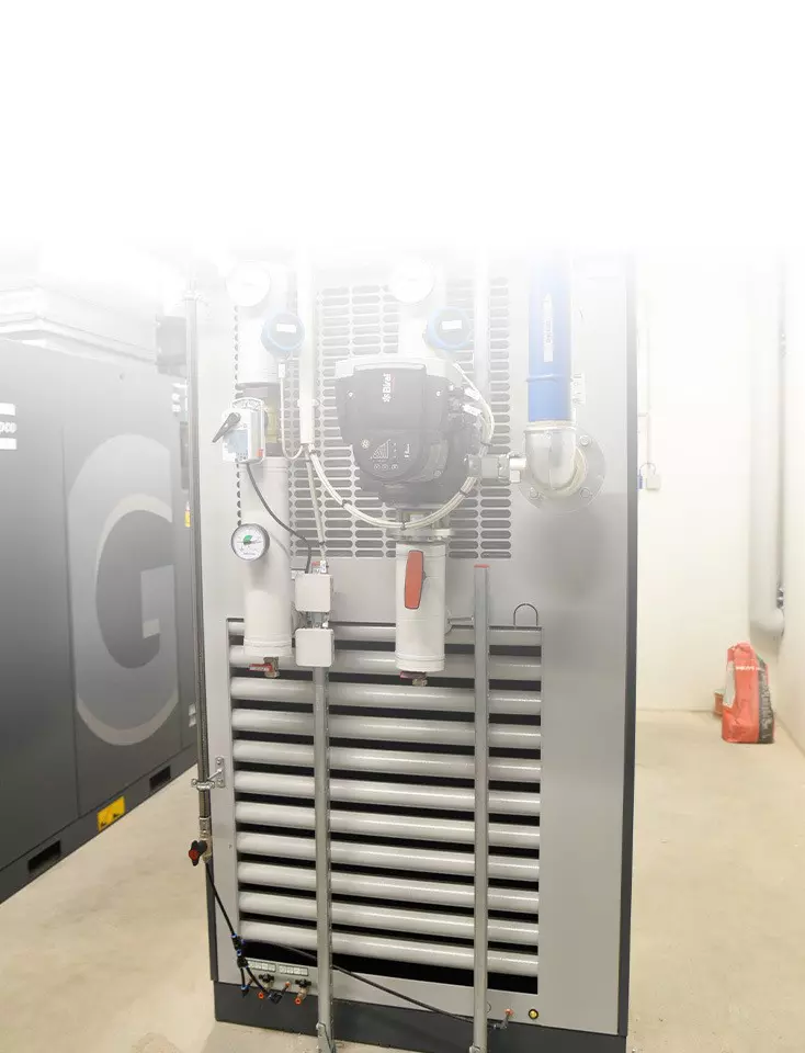 A waste heat compressor in a room.